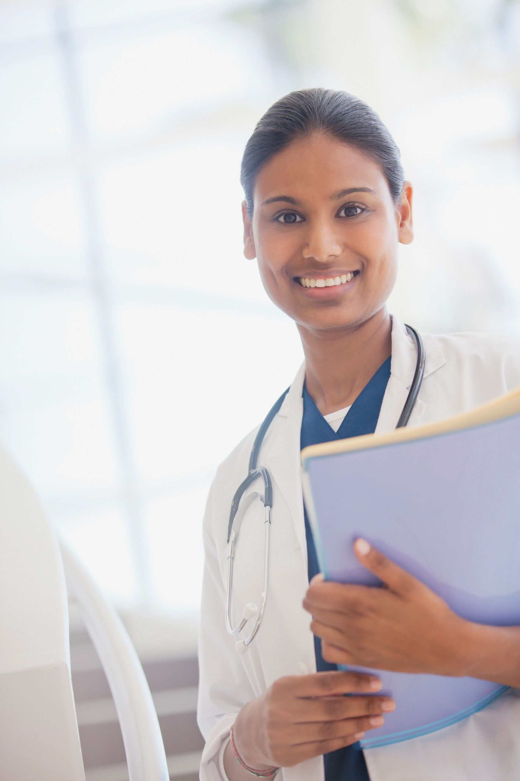 Doctor holding medical record